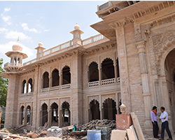 A group of people standing outside of a building